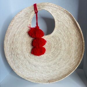 Woven Round Straw Tote with Red Tassels